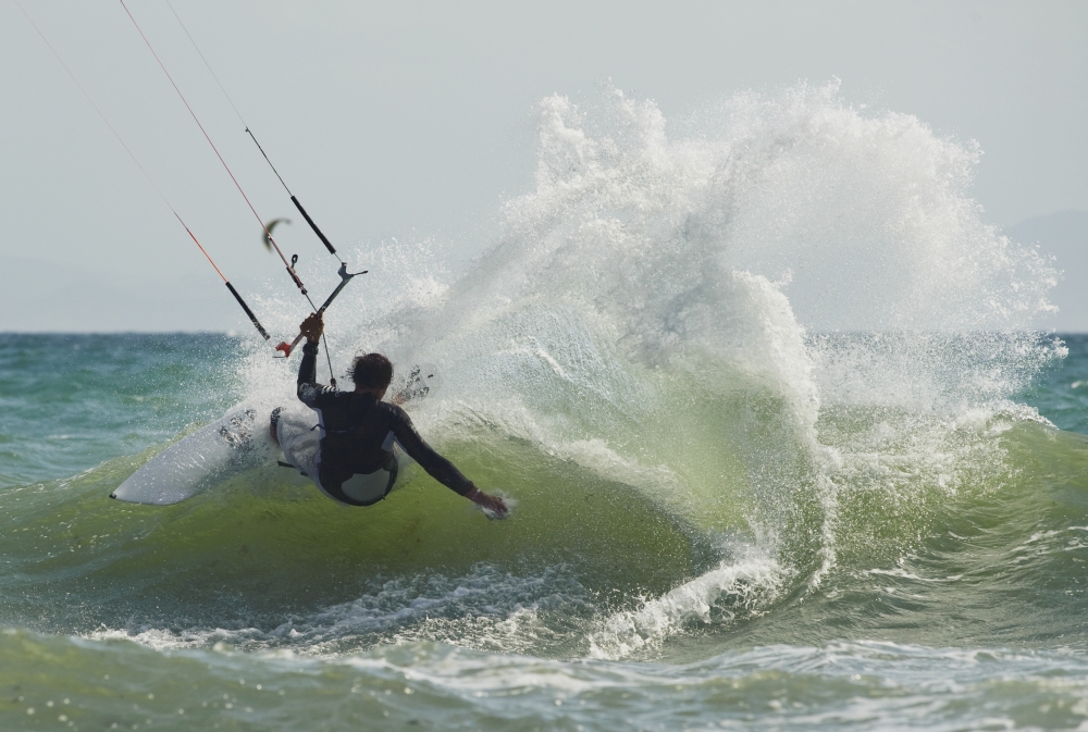Kitesurfer Catching A Wave Poster Print
