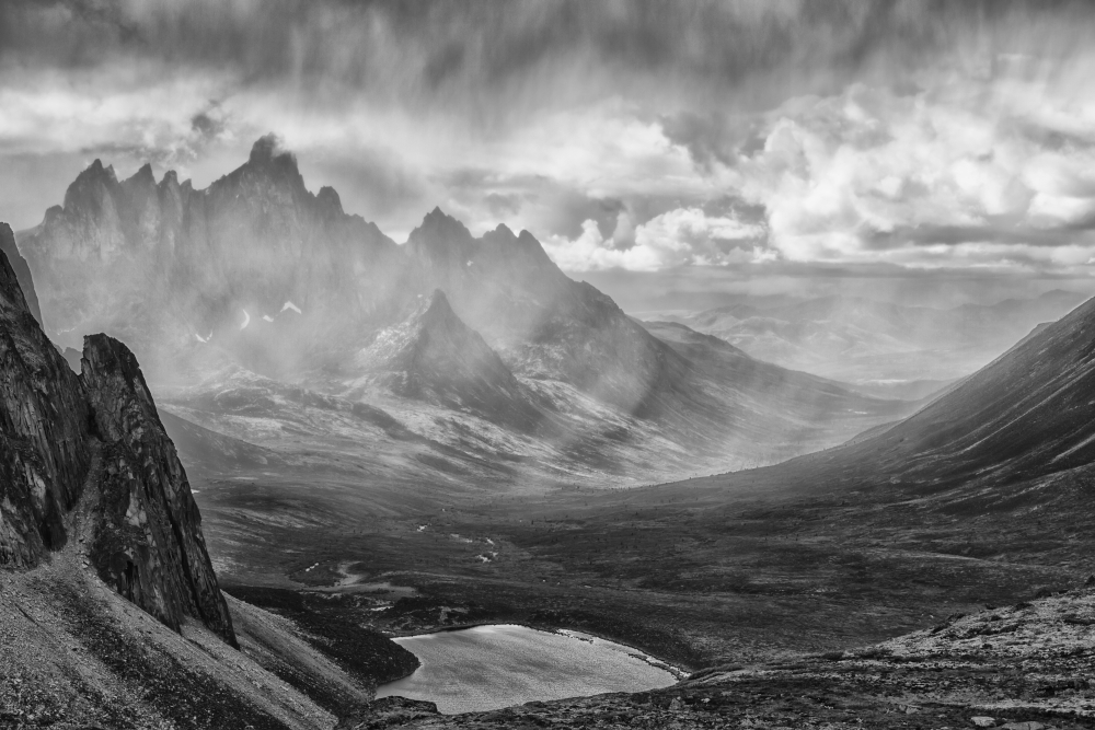 Black & White Image of A Rain Storm Over The Tombstone Valley in Tombstone Territorial Park with Tombstone Mountain Poster Print - 19 x 12 in -  Posterazzi, DPI12271119