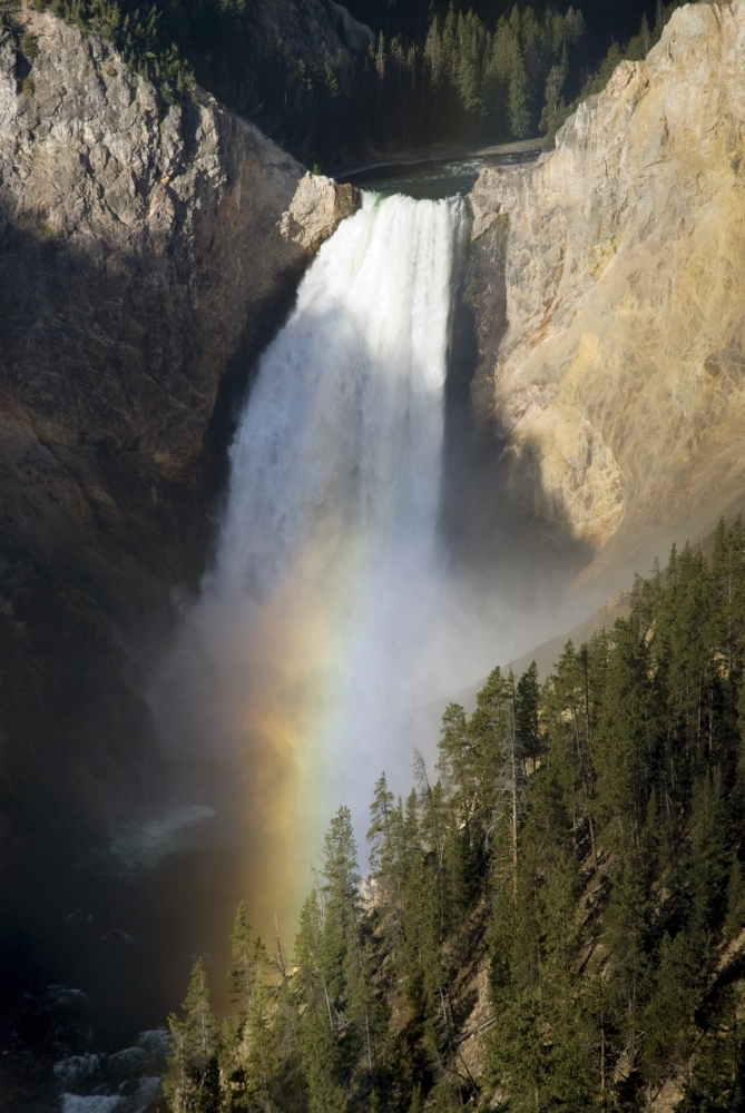 Waterfall Over Cliff Creating A Rainbow Poster Print - 12 x 19