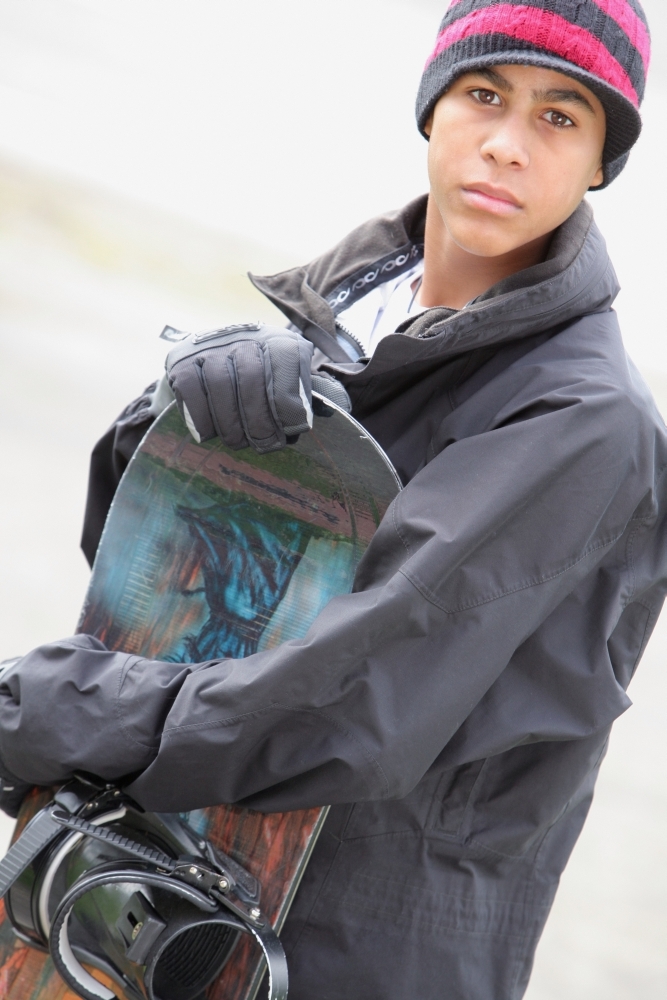 A Boy with A Snowboard Poster Print - 24 x 38