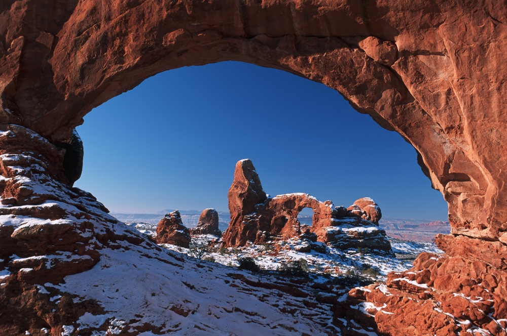 Winter Snow Covers Turret Arch Looking Through The North Window Formation At Arches National Park - Utah, USA Poster Print, 19 x 12