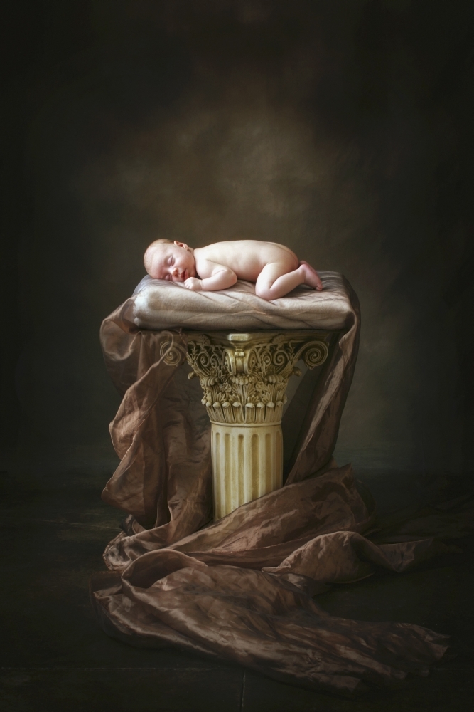 A Baby Asleep On A Pillar Poster Print - 24 x 36 - Large