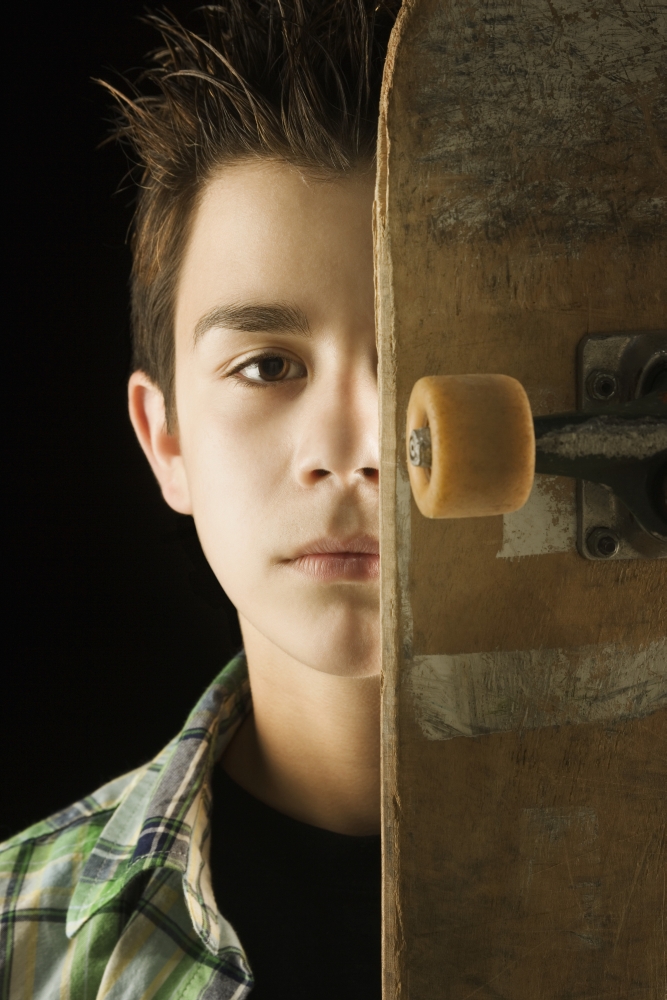 A Boy with A Skateboard Poster Print - 24 x 38