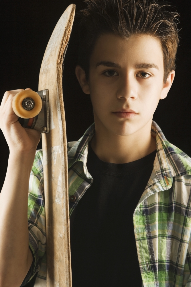 A Boy with A Skateboard Poster Print, 24 x 38 - Large