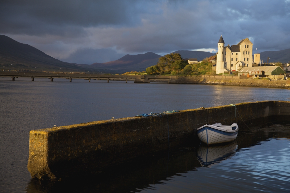 Caherciveen - County Kerry - Ireland - The Old Barracks In Evening Light with A Row Boat Moored to The Harbour Wall Poster Print - 38 x 24 - Large