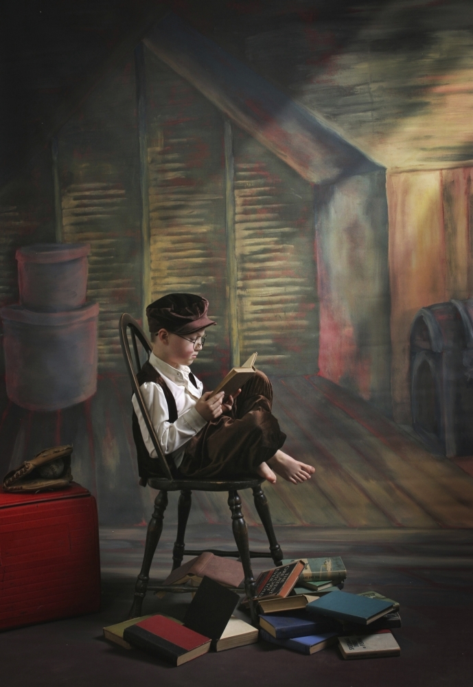 DPI1877046LARGE A Boy Posed Reading Old Books - Victoria, British Columbia, Canada Poster Print, 22 x 34 - Large