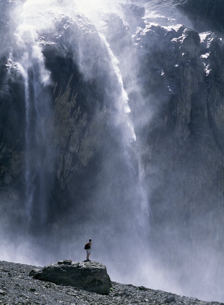 Walker Beneath Waterfall In The Cirque De Gavarnie Poster Print - 24 x 32 - Large