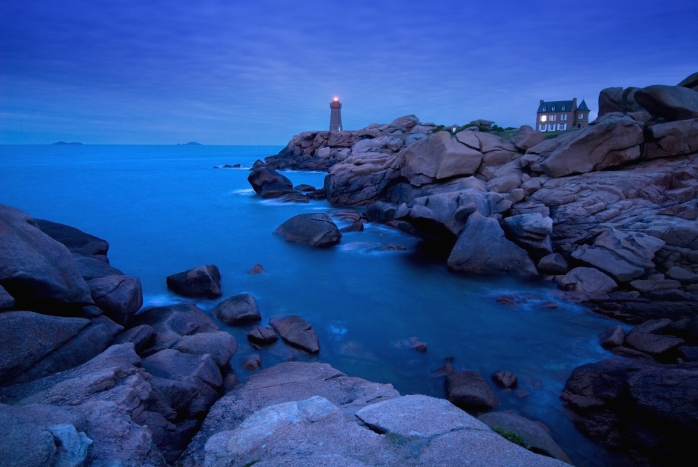 Small Lighthouse & House At Dusk Poster Print