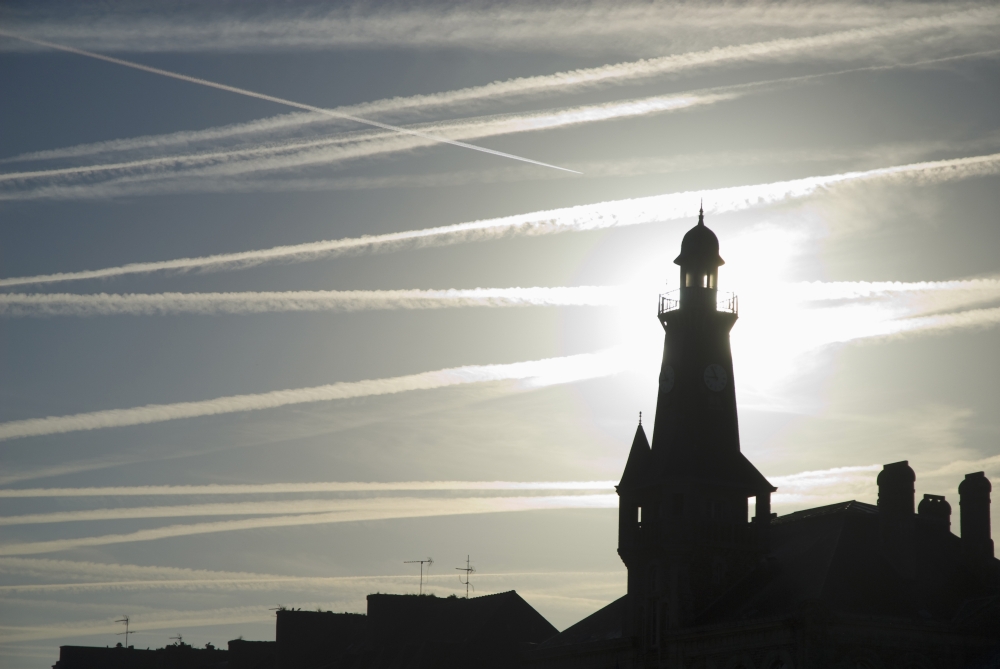 Airplane Contrails Above Lighthouse Poster Print, 34 x 22 - Large