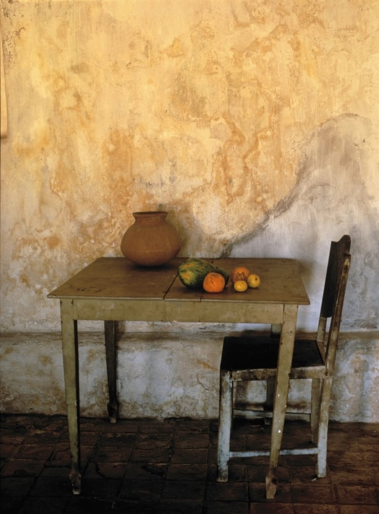 Table & Chairs Infront of Weathered Wall Poster Print - 24 x 32 - Large