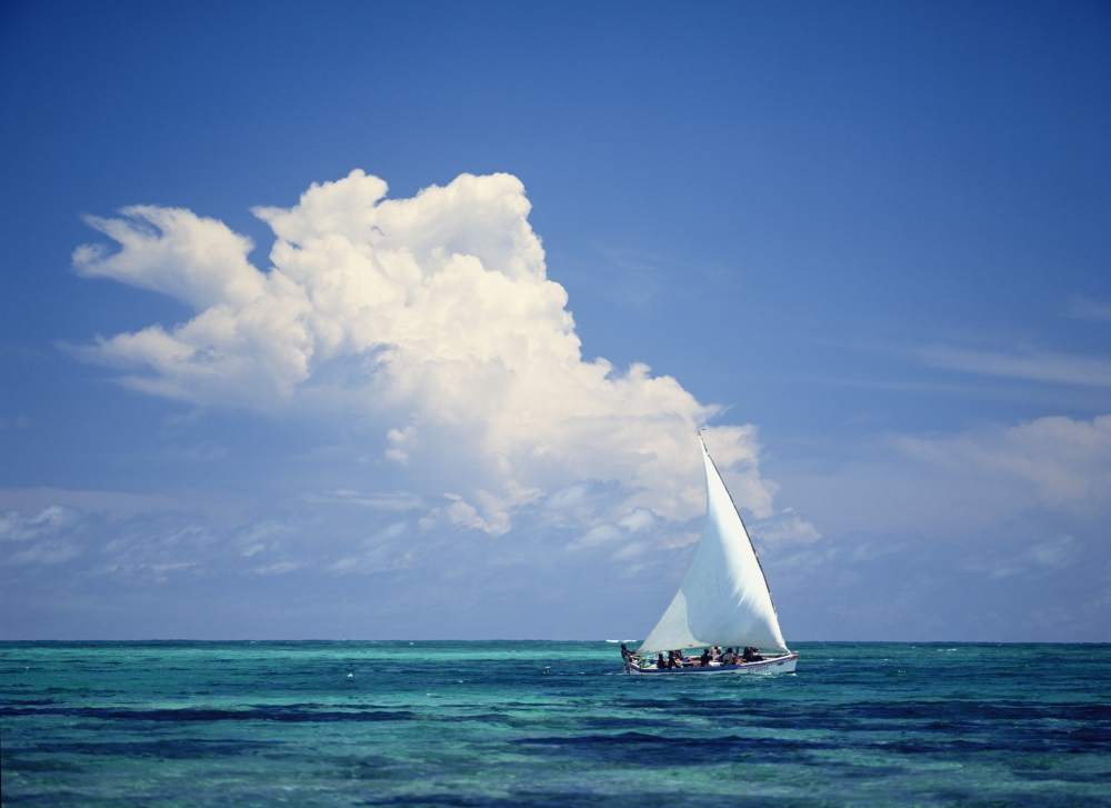Fishermen In Dhow Sailing In Shallow Water In Front of Large Thunder Storm Cloud Poster Print