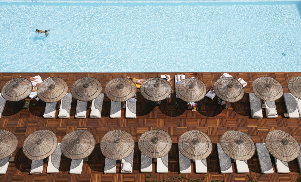 Man Swimming In Pool By Sunloungers - 19 x 12