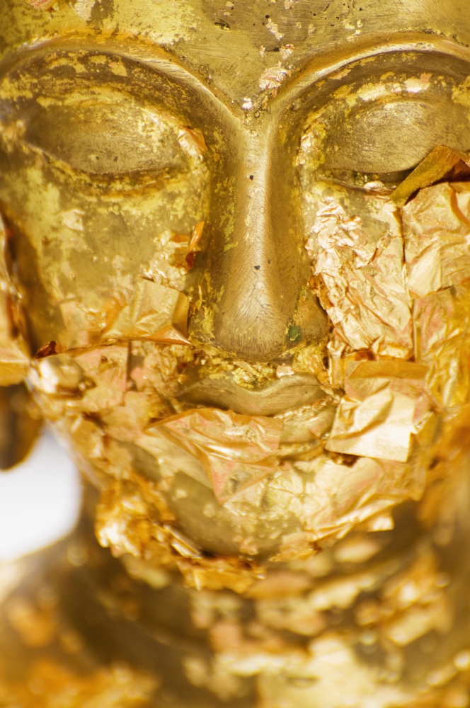 Gold Leaf Offerings On Statue At Wat Phra Kaew Temple Poster Print