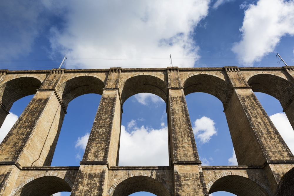 DPI12282590 Low Angle of A Stone Arched Viaduct with Blue Sky & Clouds - Morlaix Brittany France Poster Print - 19 x 12 in.