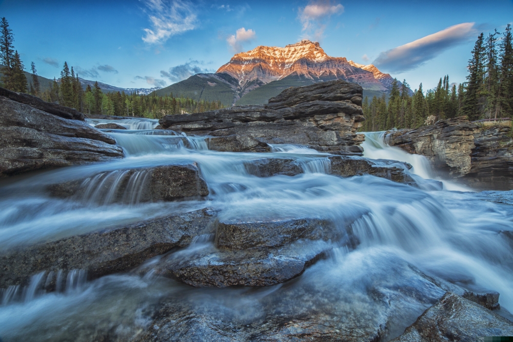 Sunset Lights Up Mount Fryatt As The Athabasca River Flows Over Athabasca Falls in Jasper National Park - Alberta Canada Poster Print - 19 x 12 in.