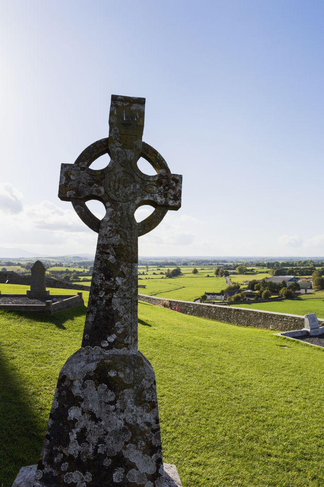 Celtic Cross on Grassy Hill with Stone Wall Under Blue Sky - Cashel County Tipperary Ireland Poster Print - 24 x 38 in. - Large