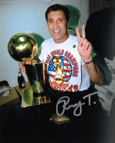 Picture of Athlon Sports CTBL-028609 Rudy Tomjanovich Signed Houston Rockets Coaching 8 x 10 in. Photo - 1995 NBA Finals & 2X Champs with Trophy