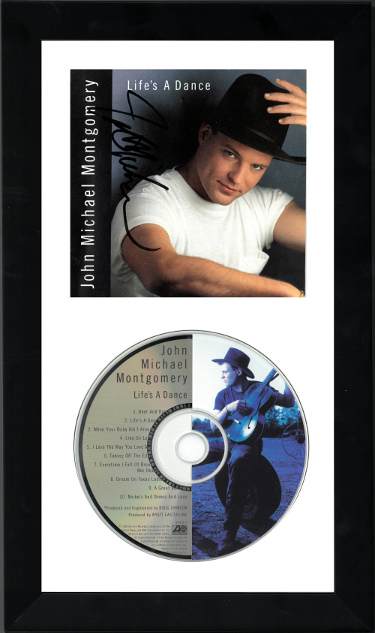 Picture of RDB Holdings & Consulting CTBL-F26558 John Michael Montgomery Signed 1992 Lifes A Dance Album Cover Booklet with CD & 6.5 x 12 in. Custom Framing - JSA No.GG38274