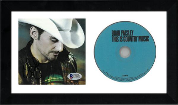 Picture of RDB Holdings & Consulting CTBL-F27617 Brad Paisley Signed this is Country Music Album Cover with CD & 6.5 x 12 in. Custom Framing - Beckett & BAS No.E55079