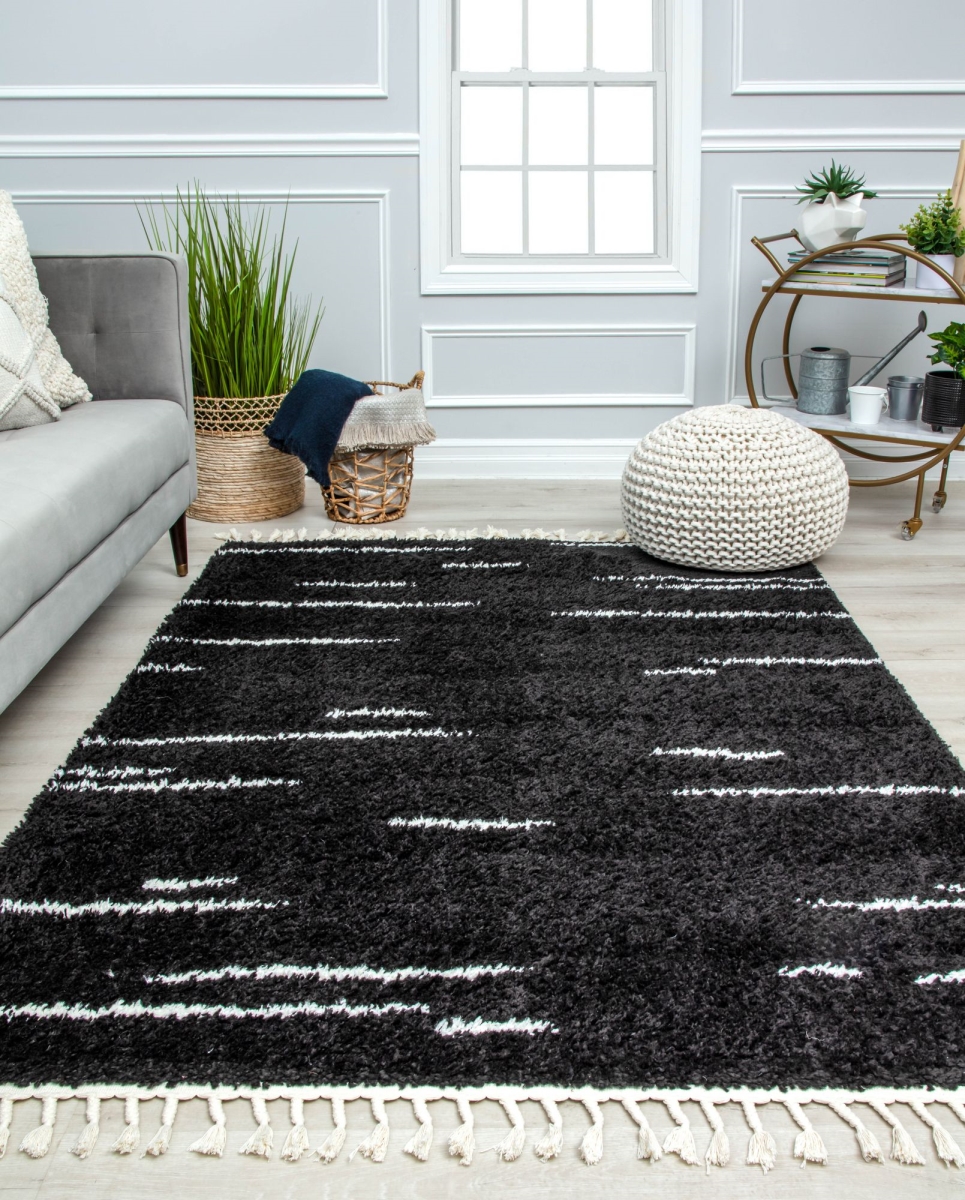 Picture of CosmoLiving RA32616 2 ft. 6 in. x 8 ft. BT40A Introspective Black Abstract Shag Area Rug