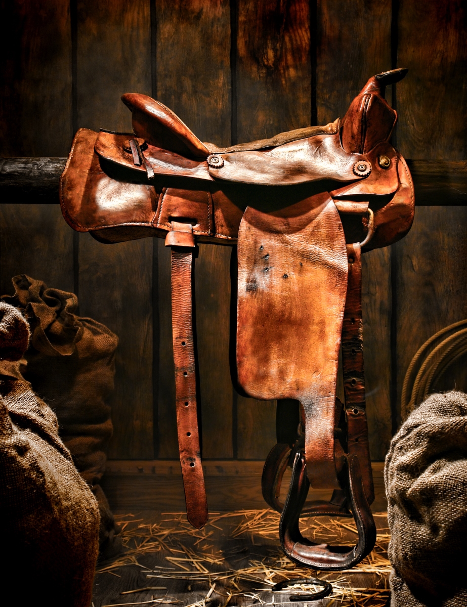 Picture of AFD Home 12016855 Western Saddle on a Canvas & Wood Rail Gallery Wrap