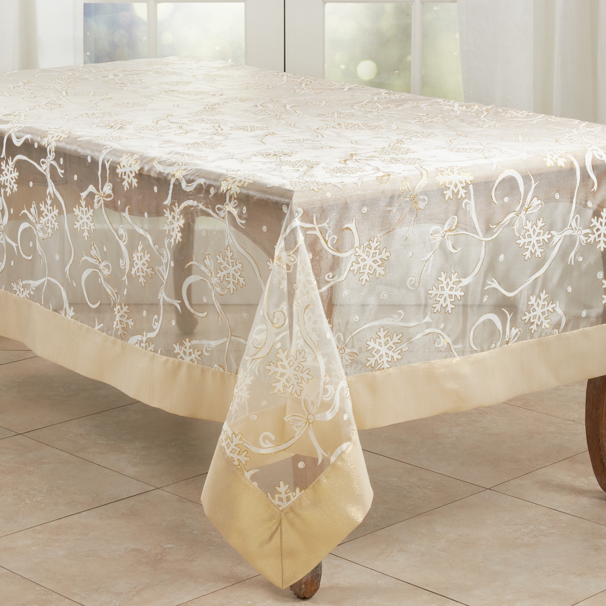 Picture of Saro Lifestyle XJ366.GL65120B 65 X 120 in. Printed Snowflake & Ribbon Tablecloth, Gold