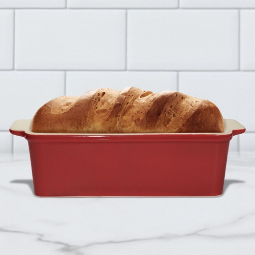 Picture of SASSAFRAS ENTERPRISES 2574RGRM Loaf Pan - Red Glazed--Outer Dims 9' L x 5' W---Inner 8.5' L x 4.5' W