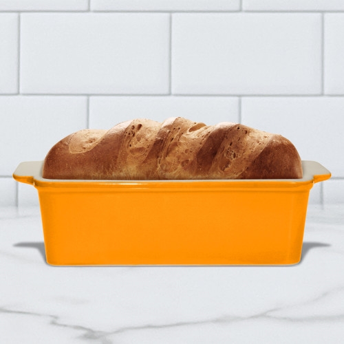 Picture of SASSAFRAS ENTERPRISES 2574TGRM Loaf Pan - Tangerine Glazed--Outer Dims 9' L x 5' W---Inner 8.5' L x 4.5' W