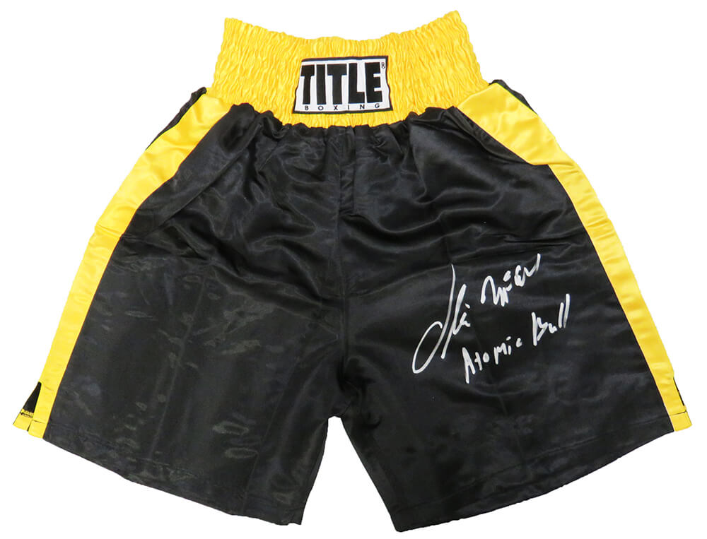 MCCTRU502 Oliver McCall Signed Title Black with Gold Trim Boxing Trunks with Atomic Bull