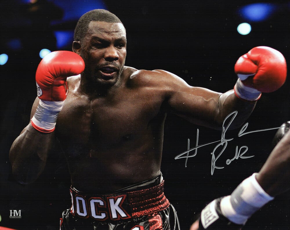 Picture of Schwartz Sports Memorabilia RAH08P503 8 x 10 in. Hasim Rahman Signed Boxing Punching Action Photo with Rock