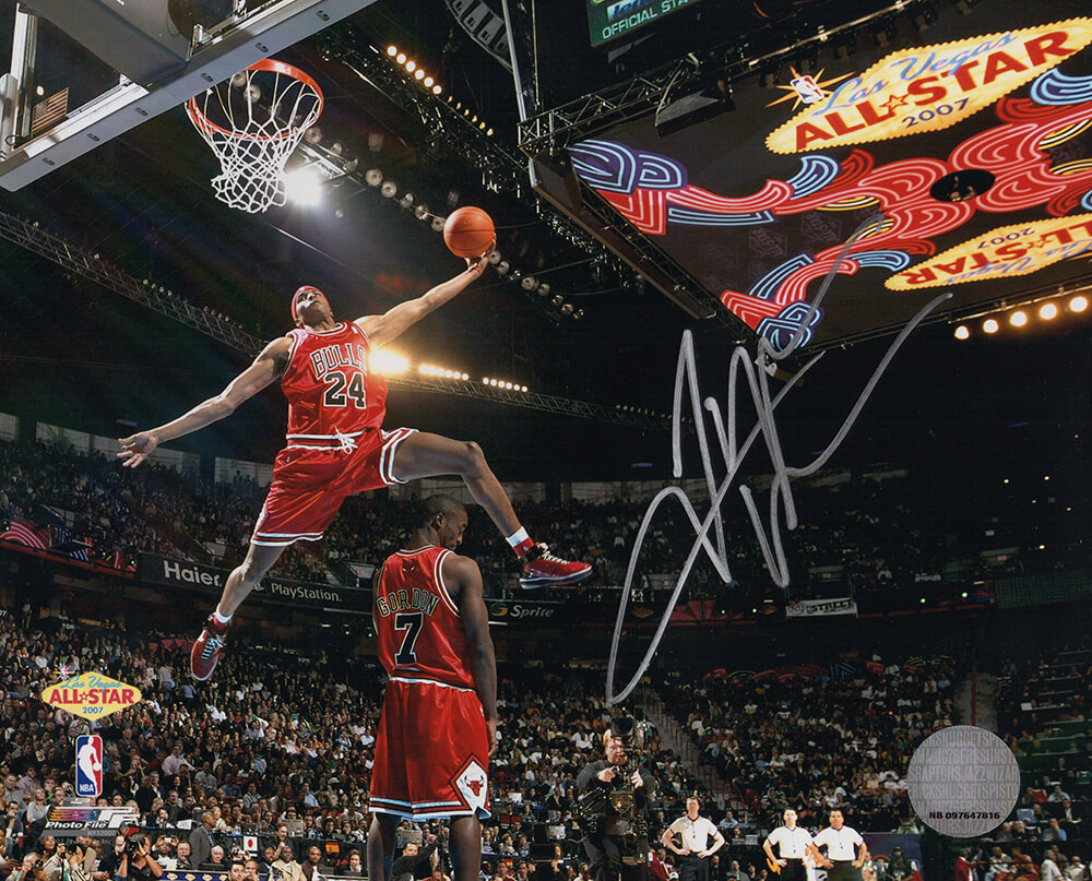 Picture of Schwartz Sports Memorabilia THO08P220 8 x 10 in. Tyrus Thomas Signed Chicago Bulls 2007 All Star Game Dunk Contest Jumping Over Teammate Photo