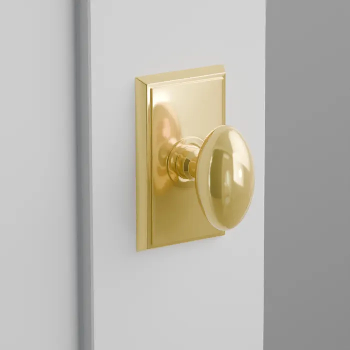 8221EUS3NL 1.25 To 2 in. Door Egg Knob 2.375 in. Backset Privacy with Rectangular Rose - Unlacquered Brass Finish