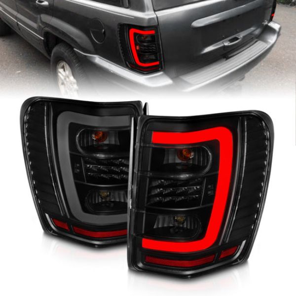 311395 Black Housing Smoke Lens LED Tail Lights with Light Bar for 1999-2004 Jeep Grand Cherokee
