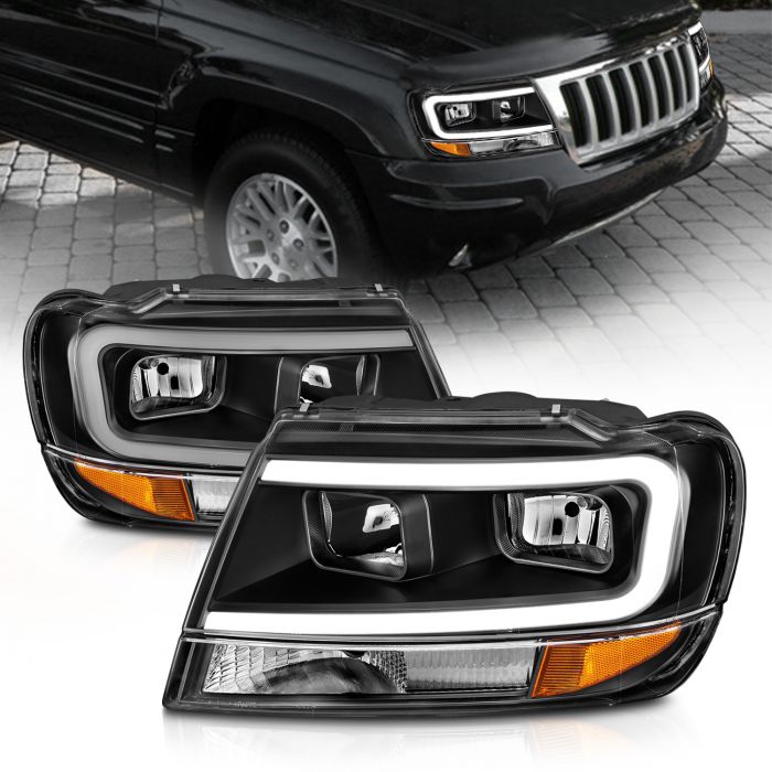 111537 Crystal Headlights with Light Bar Black Housing for 1999-2004 Jeep Grand Cherokee