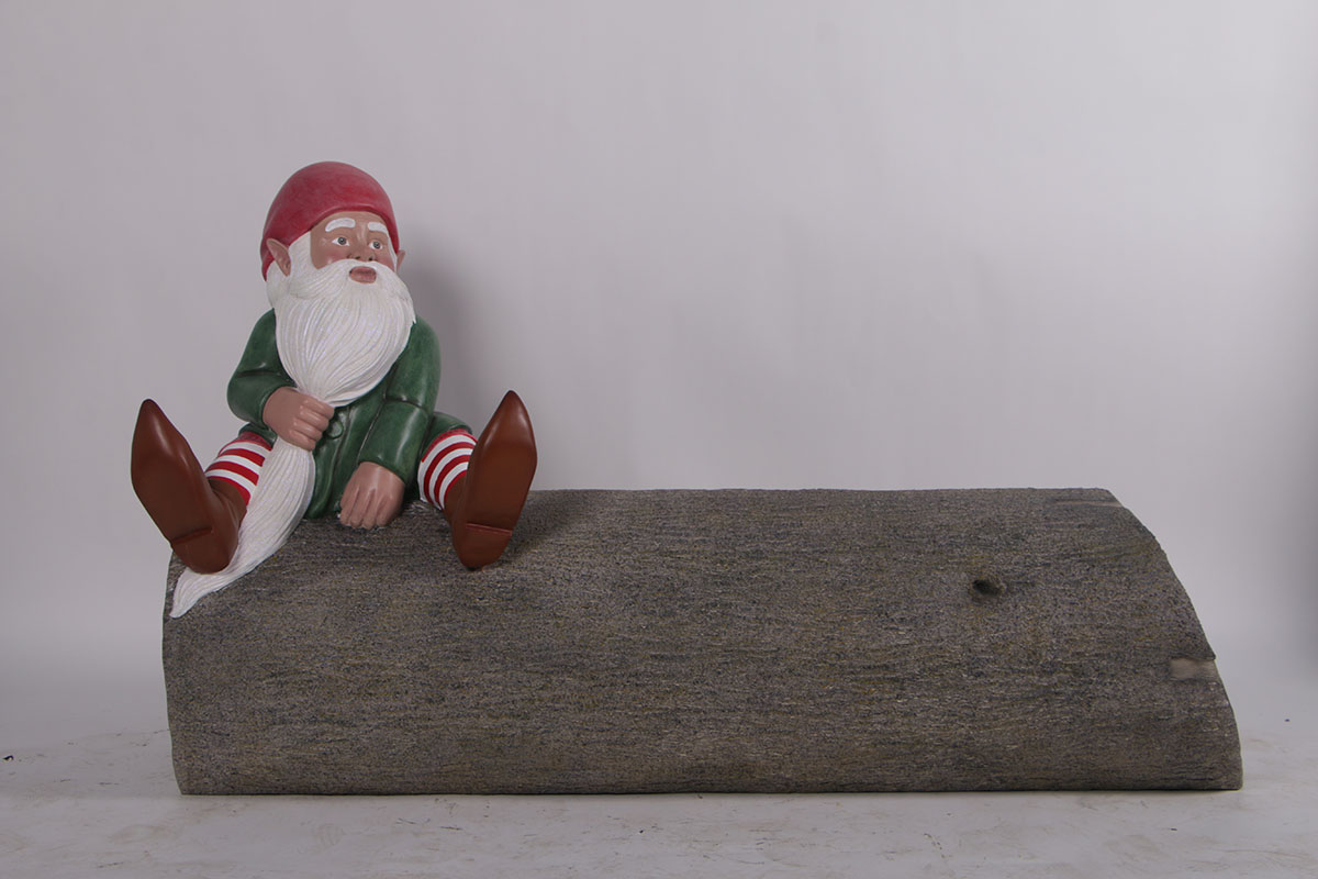 3.2 ft. Gnome Sitting On A Log Figurine