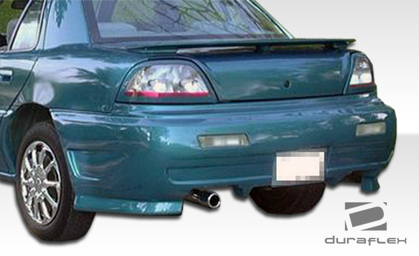 Picture of Duraflex 101198 1992-1995 Pontiac Grand Am Type X Rear Bumper Cover&#44; Signature Black - 1 Piece