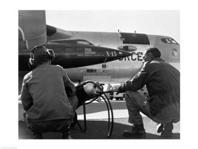 Picture of PVT/Superstock SAL25543867 Rear view of two men crouching near fighter planes  X-15 Rocket Research Airplane  B-52 Mothership -24 x 18- Poster Print