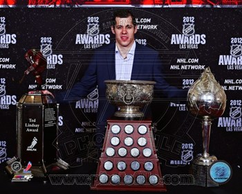 Picture of Photofile PFSAAOZ14301 Evgeni Malkin with the 2012 Ted Lindsay Award  the Art Ross Trophy and the Hart Trophy Photo Print -8.00 x 10.00