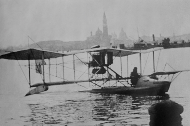 Picture of Buy Enlarge 0-587-46109-LP12x18 Biplane Land in the Canals of Venice; Captain Ginocchios Airplane- Paper Size P12x18