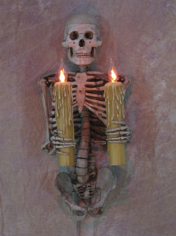 Wall Sconce Medium Skeleton Torso holding two candles
