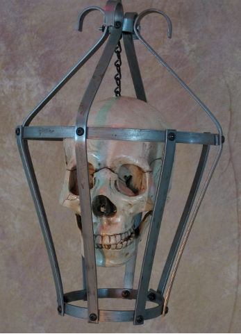 Skull cage with aged skull