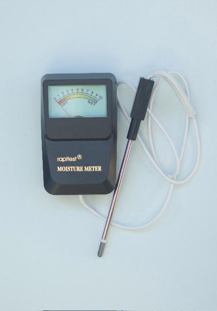 Picture of Luster Leaf 1820 Rapitest Moisture Meter With Probe On