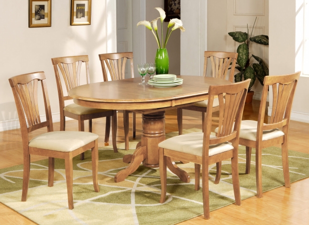 Picture of East West Furniture AVON7-OAK-C 7PC Oval Dining Set with Single Pedestal with 18 in. leaf and 6 Cushioned seat chairs in Oak Finish