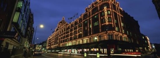 PPI95031L Low angle view of buildings lit up at night  Harrods  London  England Poster Print by  - 36 x 12 -  Panoramic Images