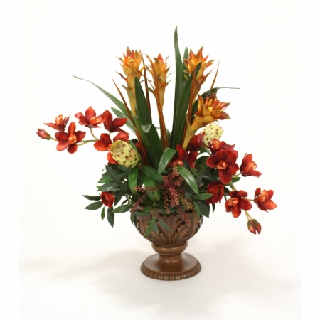 International  Orchids Berries Ranunculus & Protea in Acanthus Leaf Compote